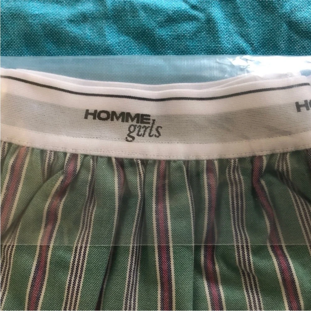 HOMMEGIRLS Shirttail Mini Skirt. Size M.BNWT. MSRP $195.